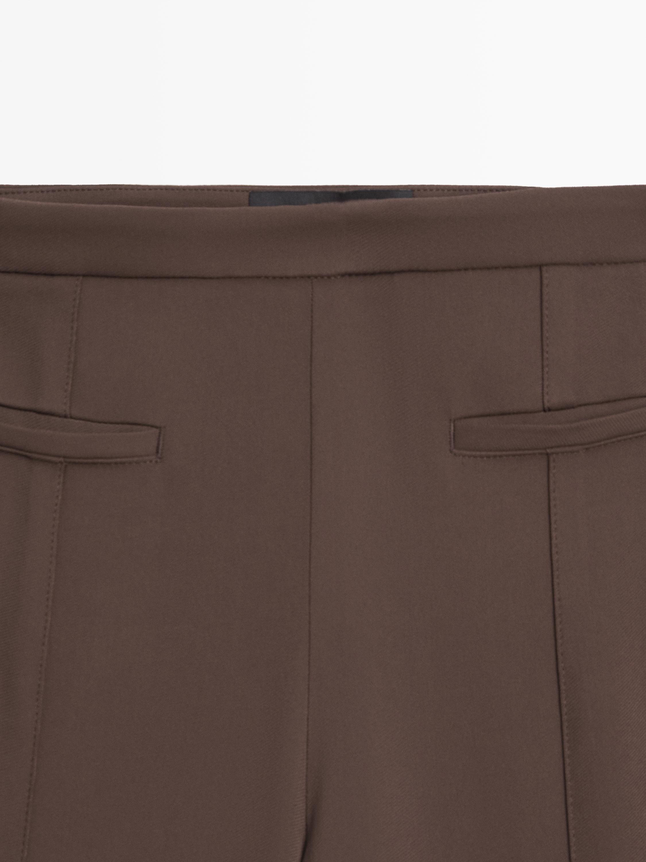 Flared trousers with pocket